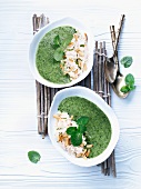 Spinach and coconut soup with pine nuts