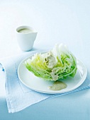 Iceberg lettuce with blue cheese dressing