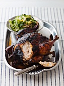 Barbecued chicken with a side salad