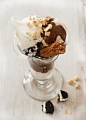 Chocolate sundae with cream and nuts