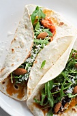 Burritos filled with rocket and almonds