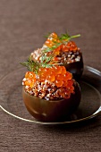 Brown tomatoes with quinoa and salmon caviar