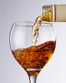 Mead being poured into a glass