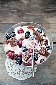 Creamy yoghurt with berries and chocolate sponge