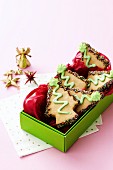 Christmas-tree shaped biscuits in a gift box