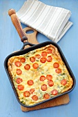 Potato tortilla with cherry tomatoes