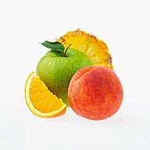 Apple, peach, orange and pineapple