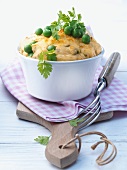 Potato soufflé with peas