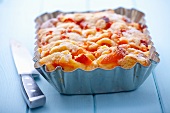 Apricot cake with a knife