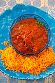 Chicken tikka masala (chicken pieces in a spicy sauce, India)