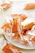 Financier biscuits wrapped in cellophane