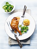 Duck leg with Brussels sprouts