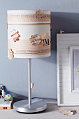 Lampshade decorated with newspaper