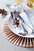 Place mat & plate decorations made from folded newspaper