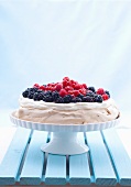 Berry pavlova on a cake stand