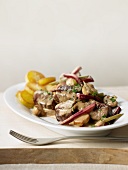 Beef Stroganoff with mushrooms, red beets and roast potatoes