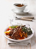 Lamb cutlets with roast potatoes and vegetables