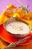 Leek cream soup with olive oil and rosemary