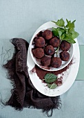 Homemade chocolate truffles with mint