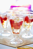 Sparkling wine with diced strawberries and ice