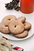 Orange sables (cookies) on a plate