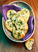 Naan breads with garlic and herbs