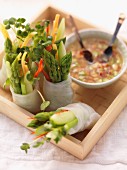 Spring rolls with asparagus and cress, with a chilli dip (Asia)