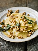 Ravioli with sage and walnuts