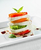 Stacked Caprese Salad with Fresh Mozzarella, Heirloom Tomatoes, Basil, Olive Oil and Balsamic Vinegar