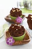 Chocolate muffins topped with chocolate buttercream