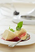 Vanilla mousse with raspberry sauce