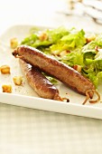 Merguez sausages with salad