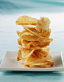 Potato Chips Stacked on a White Plate
