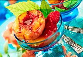Grilled peach with raspberries