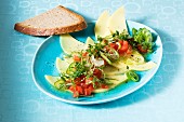 Carpaccio of cheese with tomato salsa