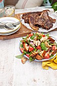 Grilled asparagus bread salad and grilled T-bone steaks