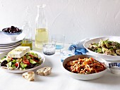 Greek salad, braised beans and peas, lamb and artichoke fricassee