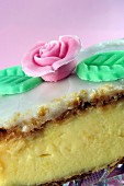 Custard slice decorated with a sugar flower (close-up)