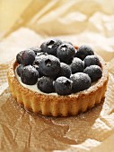 Individual blueberry tarts with crème fraîche filling