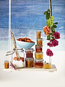 Assorted jams, fresh fruit and preserving sugar