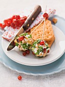 Cream cheese balls on skewers with redcurrants