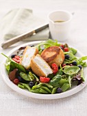 Salad leaves with summer berries and grilled halloumi