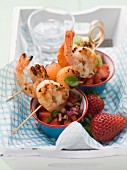 Melon and scampi skewers with strawberry salsa