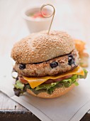 A chicken and blueberry burger