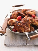 Chicken wings with raspberries