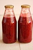 Blackberry & raspberry juice in two bottles