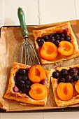 Puff pastry slices with apricots and blueberries