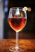 A glass of rosé wine