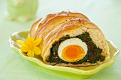 Kulebjak (pasty made with leavened dough, filled with spinach, peppers and a hard-boiled egg, Poland)