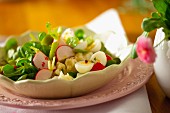 Colourful salad with quail's eggs